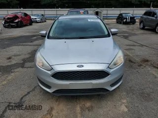 2017 Ford Focus SE with VIN 1FADP3F29HL242325, listed as a Copart auction lot 61153555 with 136,666 mi miles and Salvage title. Bid and sale history available at DreamBid. Image 5.