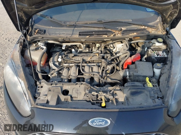 2018 Ford Fiesta SE z VIN 3FADP4BJXJM117051, wystawiony jako IAAI lot #42049956 z przebiegiem 27 367 mil mil oraz . Historia ofert i sprzedaży dostępna na DreamBid. Obrazek 10.