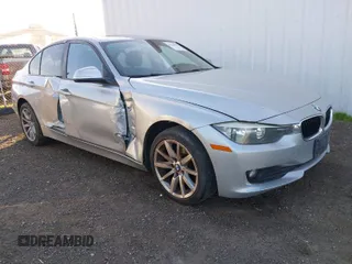 2013 BMW 3 Series 320i with VIN WBA3B1C53DK128079, listed as a IAAI auction lot 41316846 with 138,559 mi miles. Bid and sale history available at carsss.com. Image 1.