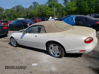 1999 Jaguar XK with VIN SAJGX2043XC040866, listed as a Copart auction lot 53712555 with 65,349 mi miles and Clean Title. Bid and sale history available at DreamBid. Image 2.