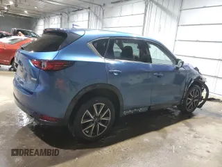 2018 Mazda CX-5 Grand Touring with VIN JM3KFBDM1J0304706, listed as a Copart auction lot 46123415 with 104,004 mi miles and Salvage title. Bid and sale history available at DreamBid. Image 3.