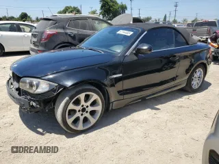 2011 BMW 1 Series 128i with VIN WBAUL7C57BVM80503, listed as a Copart auction lot 67144485 with 135,222 mi miles and Clean title. Bid and sale history available at DreamBid. Image 1.