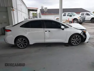 2021 Toyota Corolla SE with VIN 5YFS4MCE7MP059926, listed as a IAAI auction lot 41732717 with 48,583 mi miles and . Bid and sale history available at carsss.com. Image 13.