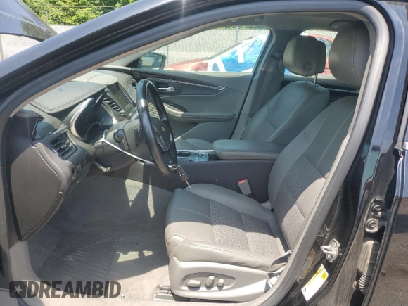 2014 Chevrolet Impala LT with VIN 2G1115SL4E9281117, listed as a Copart auction lot 62035295 with 159,378 mi miles and Salvage title. Bid and sale history available at DreamBid. Image 7.