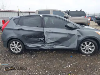 2012 Hyundai Accent SE with VIN KMHCU5AE9CU013458, listed as a IAAI auction lot 41475986 with 88,592 mi miles. Bid and sale history available at carsss.com. Image 13.