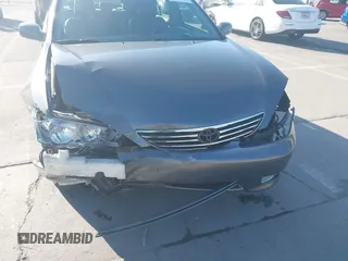 2005 Toyota Camry LE with VIN 4T1BF30K55U619313, listed as a IAAI auction lot 41854001 with 89,982 mi miles and . Bid and sale history available at DreamBid. Image 6.
