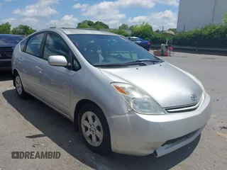 2005 Toyota Prius z VIN JTDKB20UX57051568, wystawiony jako IAAI lot #42318318 z przebiegiem 138 487 mil mil oraz . Historia ofert i sprzedaży dostępna na DreamBid. Obrazek 1.