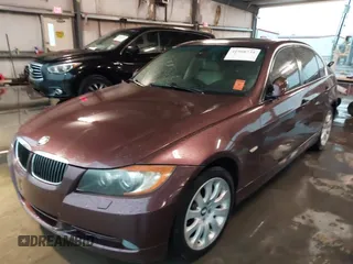 2006 BMW 3 Series 330xi with VIN WBAVD33526KV59403, listed as a IAAI auction lot 41908734 with 136,349 mi miles. Bid and sale history available at carsss.com. Image 2.