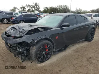 2022 Dodge Charger SRT Hellcat Widebody z VIN 2C3CDXL90NH210884, wystawiony jako Copart lot #79446294 z przebiegiem 26 611 mil mil oraz Szkoda całkowita • Salvage title. Historia ofert i sprzedaży dostępna na DreamBid. Obrazek 1.