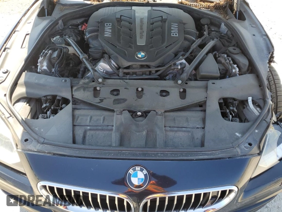 2014 BMW 6 Series 650i xDrive z VIN WBA6B4C5XED099250, wystawiony jako Copart lot #52734845 z przebiegiem Nie podano mil oraz Czysty tytuł • Clean title. Historia ofert i sprzedaży dostępna na DreamBid. Obrazek 11.