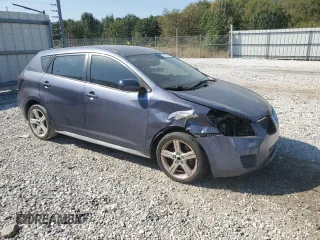 2009 Pontiac Vibe w/1SB with VIN 5Y2SP67079Z454042, listed as a Copart auction lot 74775594 with 144,727 mi miles and Salvage Title. Bid and sale history available at carsss.com. Image 4.
