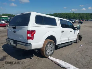 2019 Ford F-150 XL with VIN 1FTEW1C47KKE22590, listed as a IAAI auction lot 42418181 with 123,197 mi miles and . Bid and sale history available at DreamBid. Image 4.