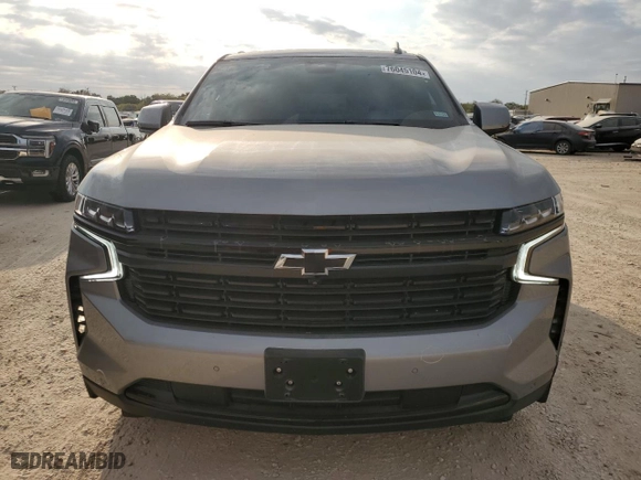 2023 Chevrolet Suburban RST with VIN 1GNSCEKD9PR556589, listed as a Copart auction lot 76045104 with 7,411 mi miles and Salvage Title. Bid and sale history available at carsss.com. Image 5.