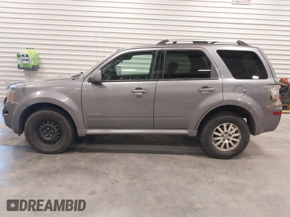 2008 Mercury Mariner Premier z VIN 4M2CU87108KJ15433, wystawiony jako IAAI lot #41924055 z przebiegiem 168 569 mil mil oraz . Historia ofert i sprzedaży dostępna na DreamBid. Obrazek 14.