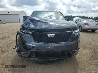 2021 Cadillac XT6 Sport with VIN 1GYKPGRS0MZ187818, listed as a Copart auction lot 66967824 with 66,956 mi miles and Salvage Title. Bid and sale history available at carsss.com. Image 5.