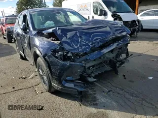 2019 Mazda CX-5 Touring with VIN JM3KFBCM5K0659204, listed as a Copart auction lot 47072965 with 53,864 mi miles and Salvage Title. Bid and sale history available at carsss.com. Image 12.