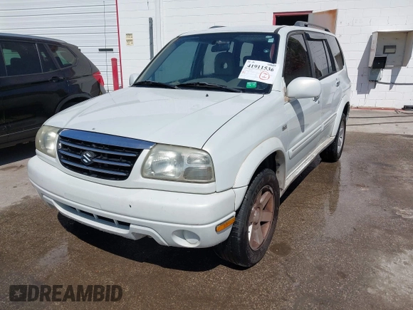 2003 Suzuki XL-7 Touring with VIN JS3TX92V934104149, listed as a IAAI auction lot 41911536 with 140,199 mi miles. Bid and sale history available at carsss.com. Image 2.