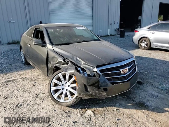 2015 Cadillac ATS Standard AWD z VIN 1G6AG1RX6F0123027, wystawiony jako Copart lot #75849154 z przebiegiem 40 857 mil mil oraz Szkoda całkowita • Salvage title. Historia ofert i sprzedaży dostępna na DreamBid. Obrazek 11.