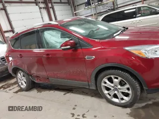 2014 Ford Escape Titanium with VIN 1FMCU9J9XEUA51732, listed as a IAAI auction lot 41542867 with 44,141 mi miles. Bid and sale history available at carsss.com. Image 13.