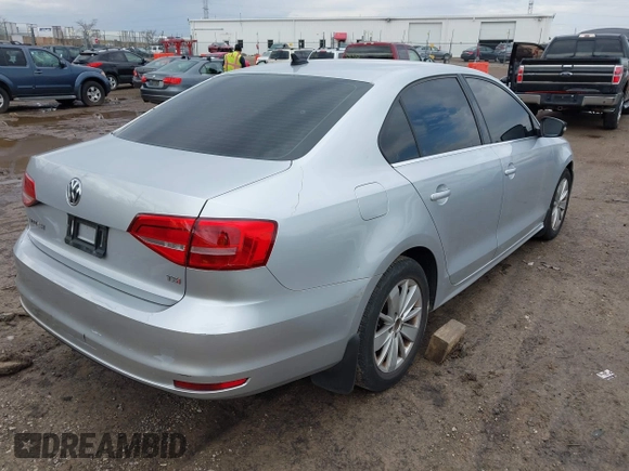 2015 Volkswagen Jetta Sedan 1.8T SE with VIN 3VWD17AJ4FM302117, listed as a IAAI auction lot 41917138 with 122,946 mi miles. Bid and sale history available at carsss.com. Image 4.