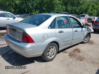 2007 Ford Focus S with VIN 1FAFP34N47W188757, listed as a IAAI auction lot 42319572 with 197,091 mi miles and . Bid and sale history available at DreamBid. Image 4.
