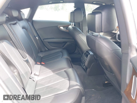 2014 Audi A7 Premium Plus z VIN WAUWGAFC4EN160144, wystawiony jako IAAI lot #41970181 z przebiegiem 118 761 mil mil oraz . Historia ofert i sprzedaży dostępna na DreamBid. Obrazek 8.