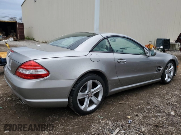 2009 Mercedes-Benz SL 550 with VIN WDBSK71F49F143492, listed as a Copart auction lot 88757425 with 89,117 mi miles and Salvage title. Bid and sale history available at DreamBid. Image 3.