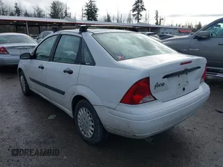 2003 Ford Focus LX with VIN 1FAFP33P73W156382, listed as a IAAI auction lot 41591885 with 174,169 mi miles and . Bid and sale history available at carsss.com. Image 3.