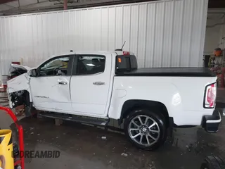 2021 GMC Canyon 4WD Denali with VIN 1GTG6EEN0M1229180, listed as a IAAI auction lot 41298304 with 55,865 mi miles. Bid and sale history available at carsss.com. Image 15.