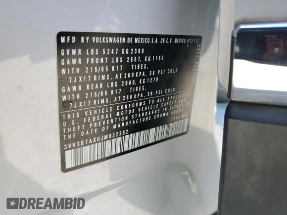 2018 Volkswagen Tiguan SEL z VIN 3VV3B7AX0JM022382, wystawiony jako Copart lot #54909245 z przebiegiem 119 714 mil mil oraz Szkoda całkowita • Salvage title. Historia ofert i sprzedaży dostępna na DreamBid. Obrazek 13.