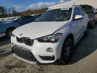 2017 BMW X1 sDrive28i with VIN WBXHU7C38H5H36694, listed as a Copart auction lot 65935442 with 96,213 mi miles. Bid and sale history available at carsss.com. Image 2.