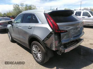 2024 Cadillac XT4 FWD Premium Luxury with VIN 1GYFZCR46RF221436, listed as a IAAI auction lot 42140984 with 32,534 mi miles and . Bid and sale history available at carsss.com. Image 3.