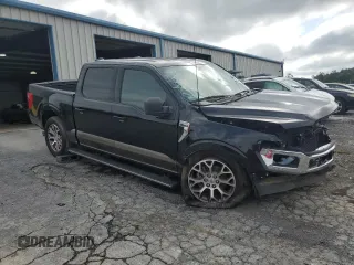 2023 Ford F-150 XL with VIN 1FTEW1C83PFA84267, listed as a Copart auction lot 65042545 with 54,508 mi miles and Salvage title. Bid and sale history available at DreamBid. Image 4.