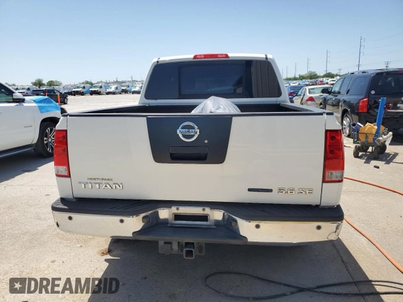 2010 Nissan Titan SE with VIN 1N6BA0ED4AN320540, listed as a Copart auction lot 51779065 with 252,827 mi miles and Salvage title. Bid and sale history available at DreamBid. Image 6.