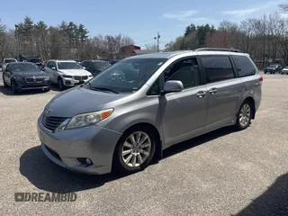 2011 Toyota Sienna XLE with VIN 5TDDK3DC3BS007297, listed as a IAAI auction lot 42158709 with 208,274 mi miles and . Bid and sale history available at DreamBid. Image 2.