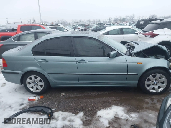 2005 BMW 3 Series 325i with VIN WBAEV33475KW16987, listed as a IAAI auction lot 41353913 with 211,222 mi miles. Bid and sale history available at carsss.com. Image 12.