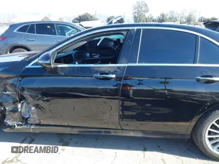 2021 Mercedes-Benz E-Class E 350 with VIN W1KZF8DB0MA889890, listed as a IAAI auction lot 41317094 with 63,075 mi miles. Bid and sale history available at carsss.com. Image 14.
