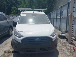 2021 Ford Transit Connect XL z VIN NM0LS6E27M1488977, wystawiony jako IAAI lot #42514014 z przebiegiem 101 505 mil mil oraz . Historia ofert i sprzedaży dostępna na DreamBid. Obrazek 12.