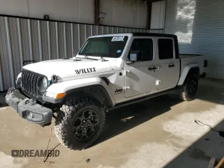 2023 Jeep Gladiator Willys z VIN 1C6HJTAG9PL555140, wystawiony jako Copart lot #73541094 z przebiegiem 10 094 mil mil oraz Czysty tytuł • Clean title. Historia ofert i sprzedaży dostępna na DreamBid. Obrazek 1.