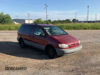 1999 Toyota Sienna LE with VIN 4T3ZF13C5XU141279, listed as a Copart auction lot 64366315 with 218,223 mi miles and Clean title. Bid and sale history available at DreamBid. Image 1.