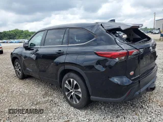 2021 Toyota Highlander XLE with VIN 5TDGZRAH2MS521284, listed as a Copart auction lot 59986685 with 106,610 mi miles and Salvage title. Bid and sale history available at DreamBid. Image 2.