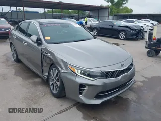 2016 Kia Optima SXL Turbo with VIN 5XXGV4L26GG048681, listed as a IAAI auction lot 42368463 with 162,955 mi miles and . Bid and sale history available at DreamBid. Image 1.