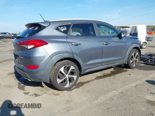 2016 Hyundai Tucson Limited with VIN KM8J33A22GU231834, listed as a IAAI auction lot 41312526 with 117,423 mi miles. Bid and sale history available at carsss.com. Image 4.