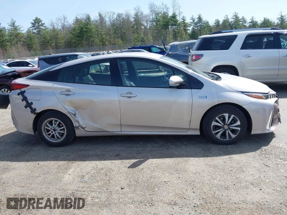 2018 Toyota Prius Plus with VIN JTDKARFP5J3091877, listed as a IAAI auction lot 42129355 with 48,736 mi miles and . Bid and sale history available at DreamBid. Image 13.