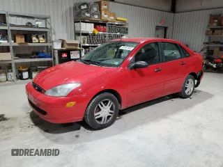 2003 Ford Focus SE with VIN 1FAFP34303W327761, listed as a Copart auction lot 81951544 with 126,758 mi miles and Salvage title. Bid and sale history available at DreamBid. Image 1.