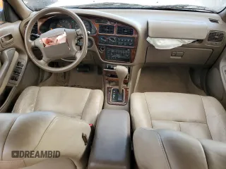 1994 Toyota Camry XLE with VIN JT2GK13E0R0038694, listed as a Copart auction lot 87843865 with 175,134 mi miles and Salvage Title. Bid and sale history available at carsss.com. Image 8.