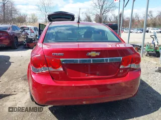 2014 Chevrolet Cruze 2LT z VIN 1G1PE5SB2E7123236, wystawiony jako IAAI lot #41882768 z przebiegiem 123 311 mil mil oraz . Historia ofert i sprzedaży dostępna na DreamBid. Obrazek 16.