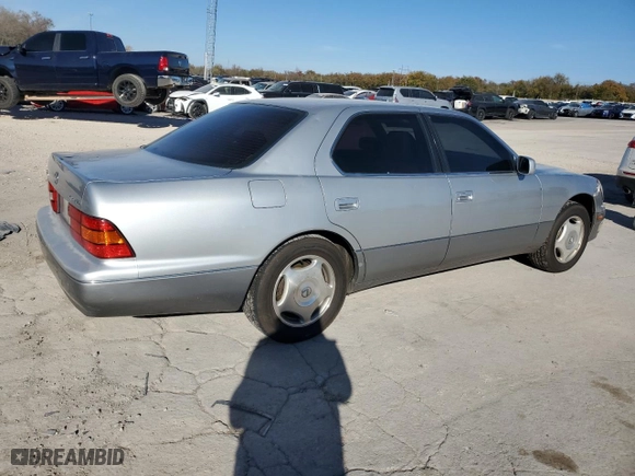 2000 Lexus LS 400 with VIN JT8BH28F3Y0170580, listed as a Copart auction lot 80991694 with 174,041 mi miles and Salvage Title. Bid and sale history available at carsss.com. Image 3.