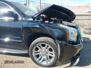 2016 GMC Yukon SLT with VIN 1GKS2BKC5GR253038, listed as a IAAI auction lot 41790030 with 101,039 mi miles. Bid and sale history available at carsss.com. Image 6.