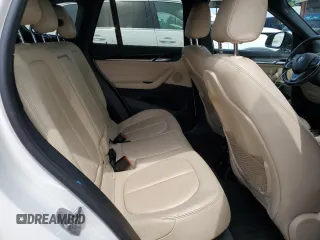 2017 BMW X1 xDrive28i with VIN WBXHT3Z37H4A55614, listed as a Copart auction lot 63491415 with 120,680 mi miles and Salvage title. Bid and sale history available at DreamBid. Image 11.